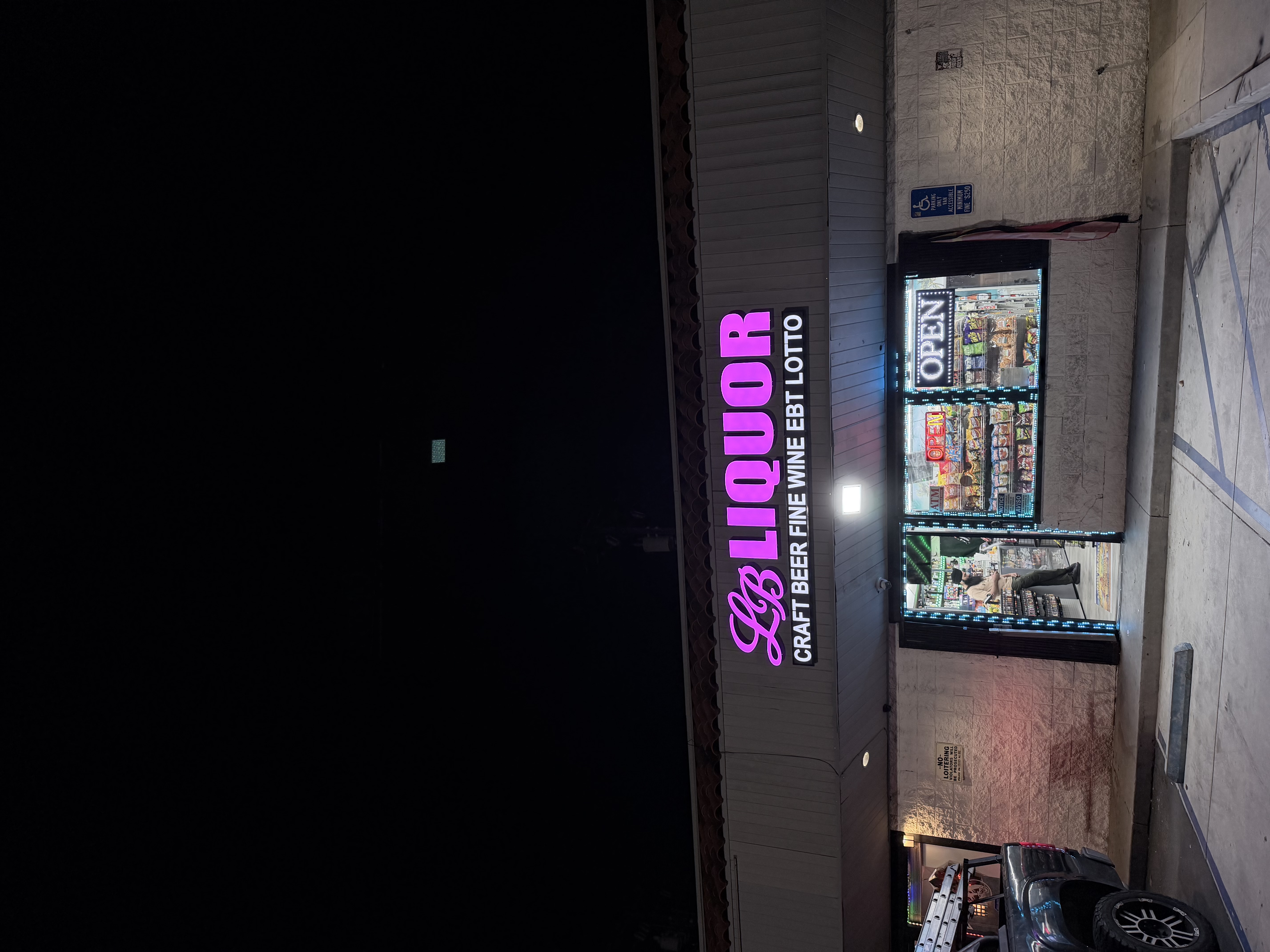 LB Liquor illuminated storefront sign