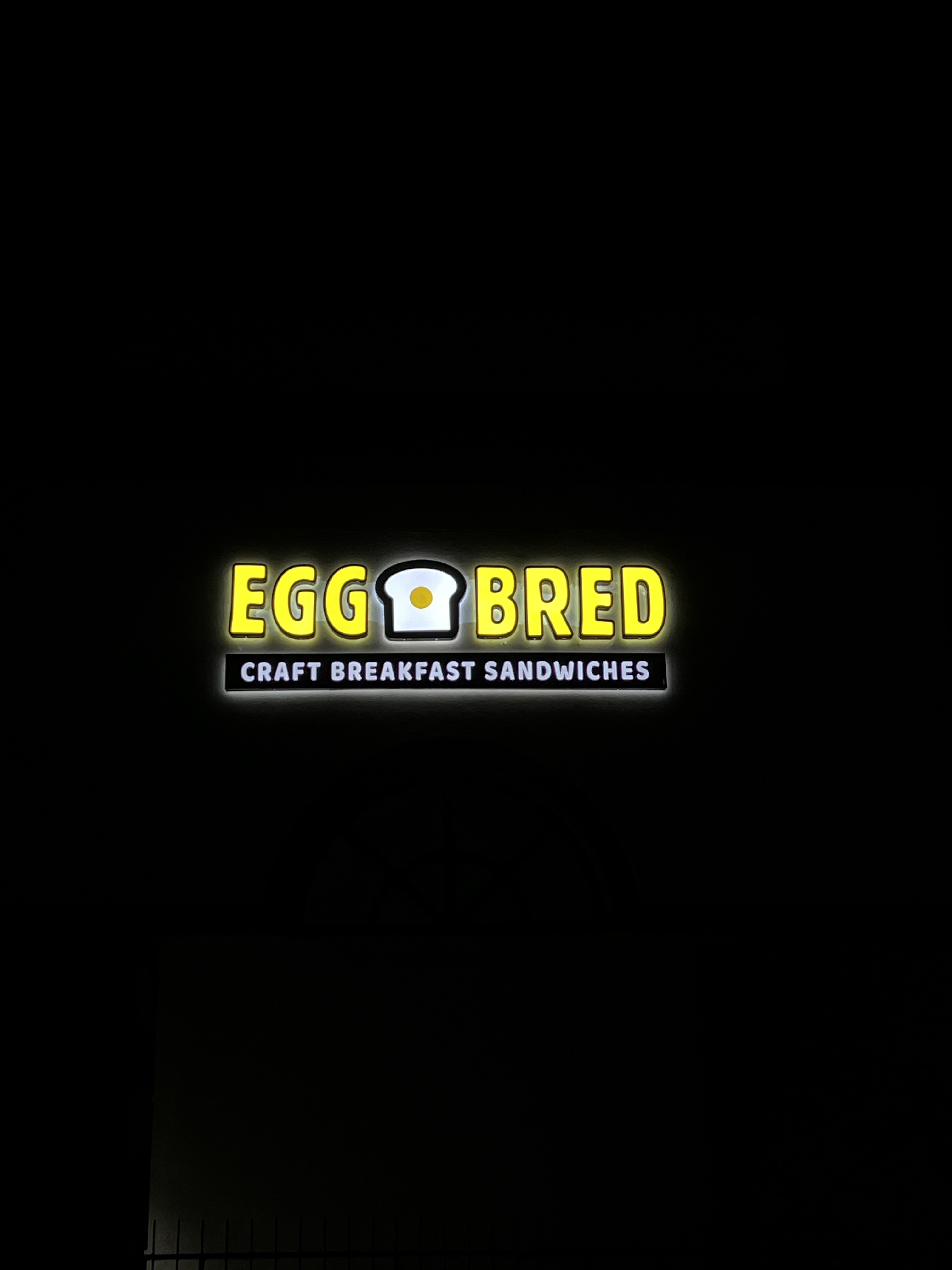 Egg Bred illuminated sign at night