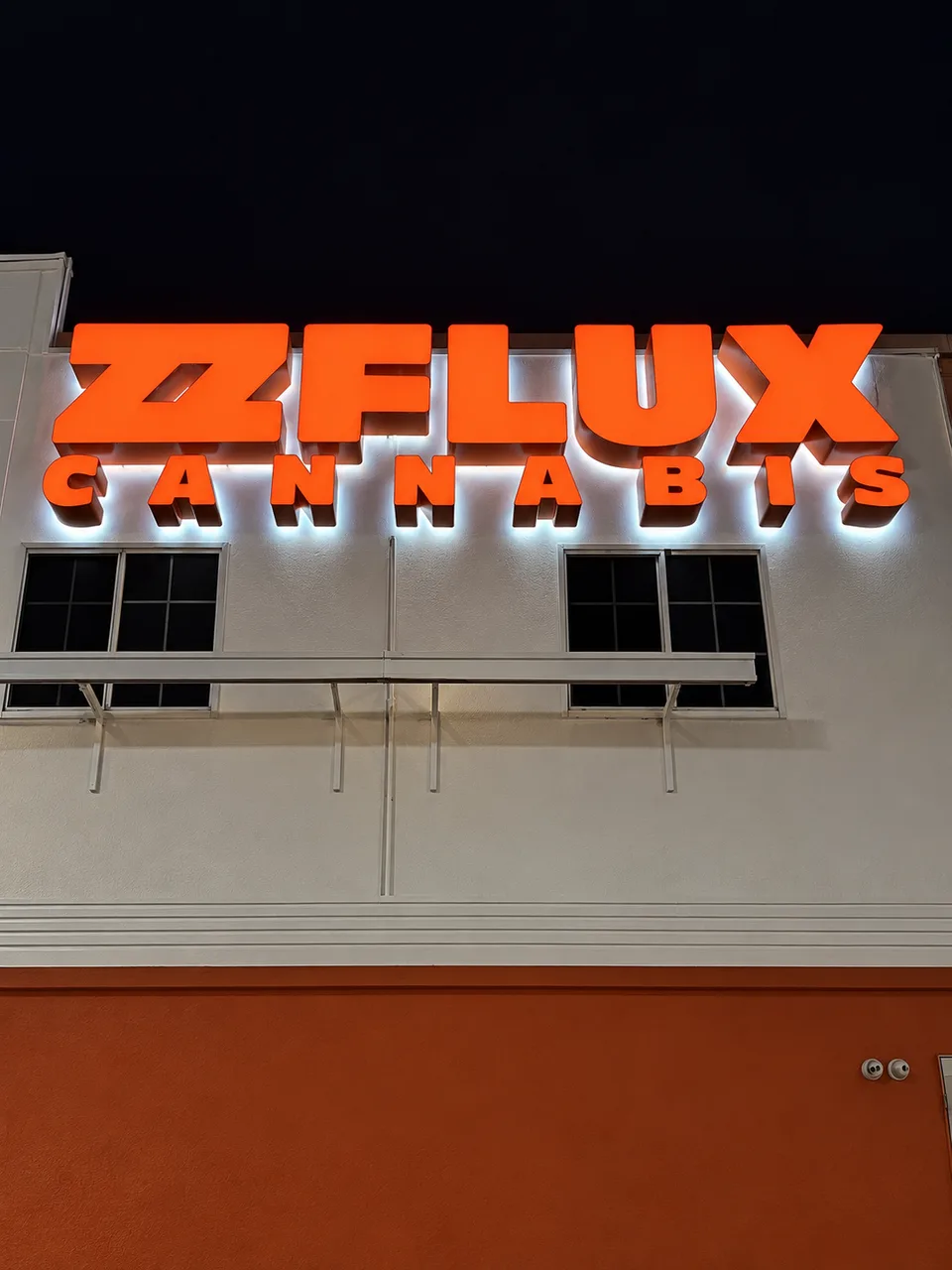 Z-Flux Cannabis orange letters with white halo illumination